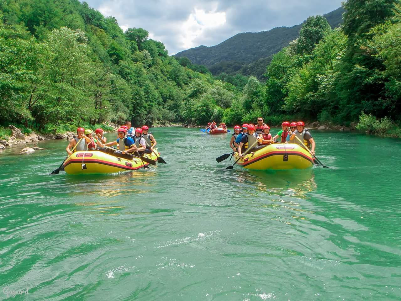 Rafting on class II whitewater rapids on the Una river